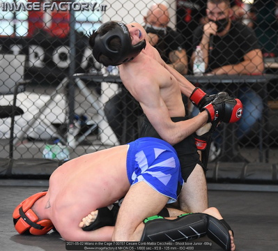 2021-05-02 Milano in the Cage 7 00757 Cesare Conti-Mattia Cecchetto - Shoot boxe Junior -66kg